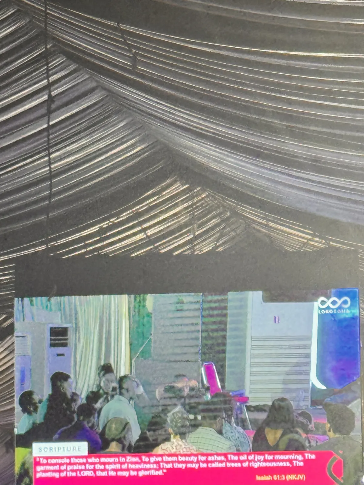 Lyrics over camera, from the back of the tent